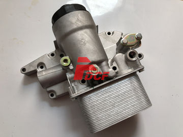 Montaje de la cubierta del refrigerador de aceite del motor D6D para las piezas del motor diesel del excavador de